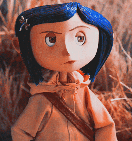 a cartoon character wearing blue clothes with her hair in the middle of the frame