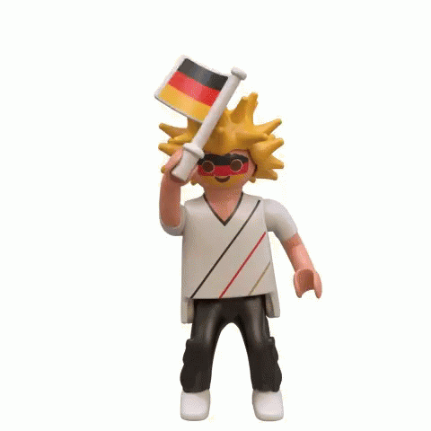 an action figure standing on top of a white background