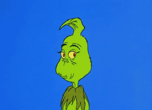 an illustration of a creepy green alien sitting
