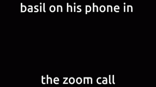 a black background with a white text that says basi on his phone in the zoom call