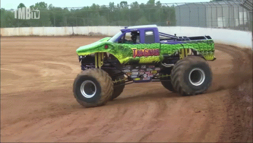 the monster truck has big tires on it