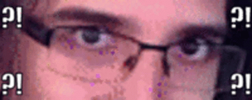 a man has glasses and blue eye color