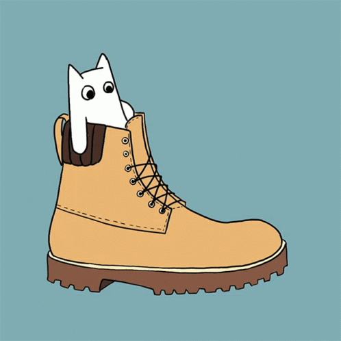 a pair of blue shoes has a cutout on the side and a white cat in a boot