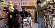 several men in a store with carts full of supplies