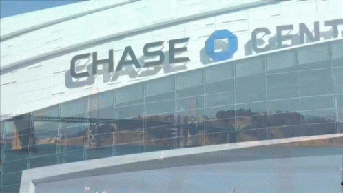 an advertit for chase q cents ad is seen through the window