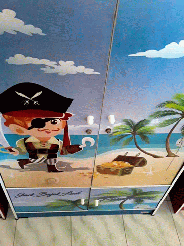 a cartoon wall mural inside an escalator