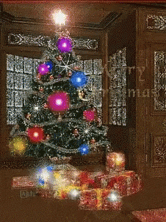the holiday tree is in a decorated room with bright lights