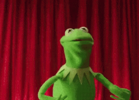 an animated frog waving and pointing