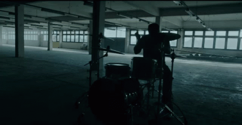 a band member is in an empty room