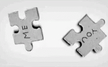 two pieces of puzzle with the word mom written on it