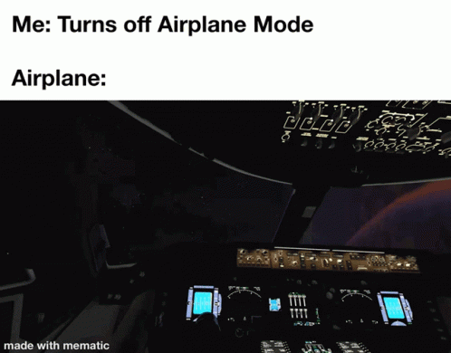 a po of the cockpit of an airplane at night