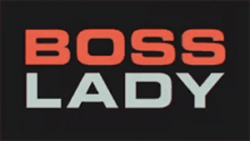 a close up of the word boss lady on a black background