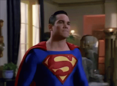 the animated superman has a red cape on it