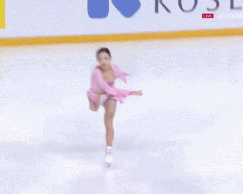 a  figure skating in an ice rink