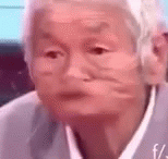 a blurry pograph of an asian man