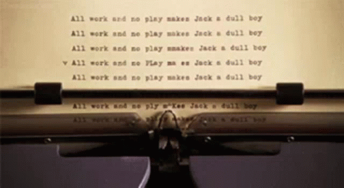 an old fashioned typewriter's ink filled screen displays a poem