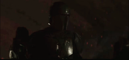 a person wearing a helmet in the dark