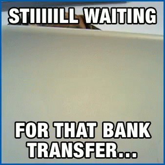 a small white brick with words saying'still waiting for that bank transfer