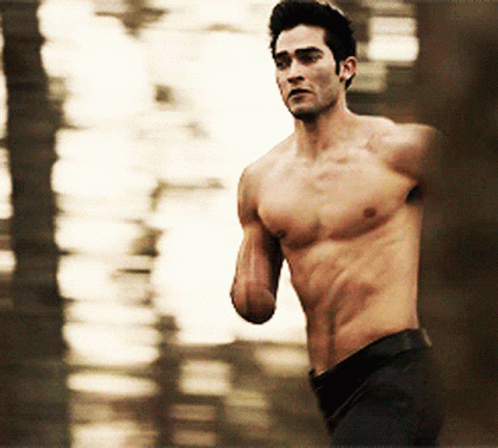 a man running in the rain without shirt