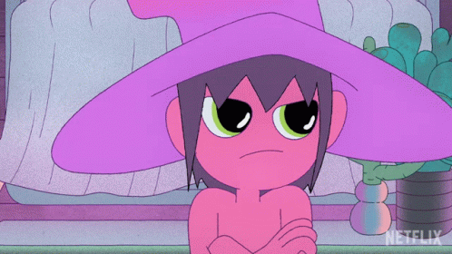 a small cartoon with big eyes and a pink hat