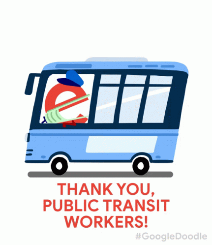 a bus driving down a street with a thank you public transit worker on the front