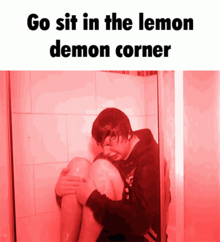 boy in the shower holding onto soing with words that read go sit in the lemon demon corner
