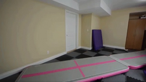 a room with purple lines on the floor