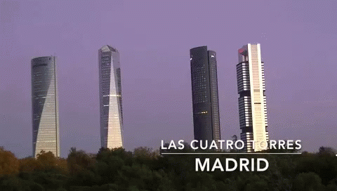 a pink sky over four skyscrs with the words las caafro y tres madrid in front