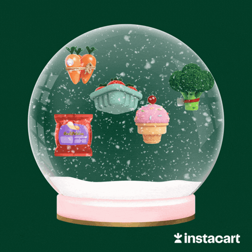 a snow globe is adorned with green trees, mushrooms and other objects