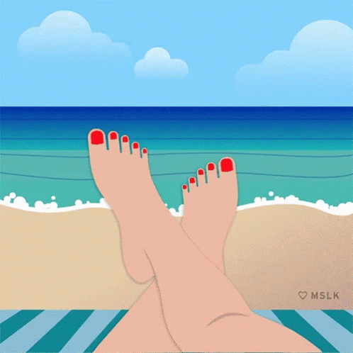 a pair of blue toe nails on a beach