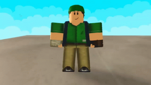 a lego man wearing a green shirt, blue jeans and green hat