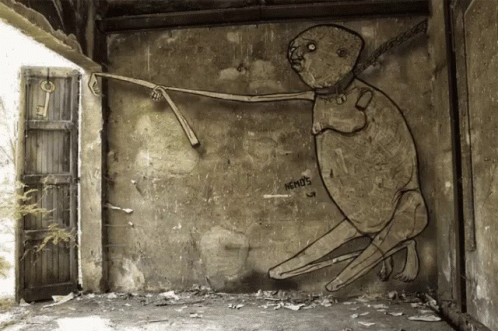 an old mural of a boy swinging on a wire
