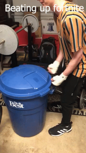 man in white gloved hands places a plastic container on top of a bicycle