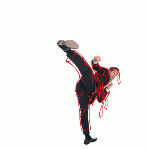 a person on a white background, holding up a frisbee