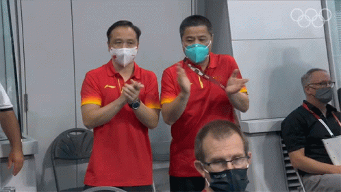 the three men are wearing masks while holding soing