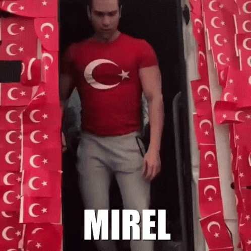 a man standing in the door to a building with the words mrrell printed on it