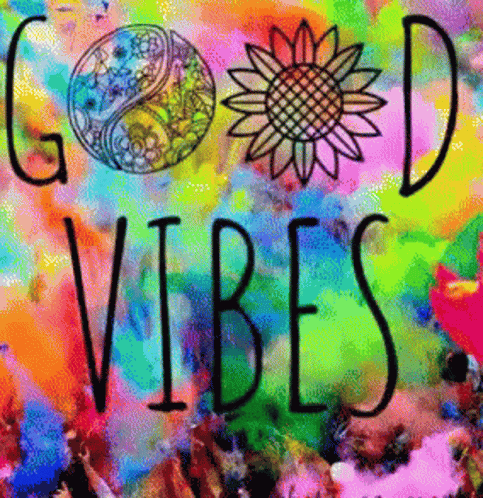 the words good vibes painted on a wall
