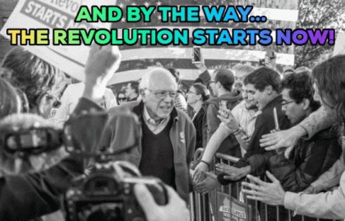 bernie sanders is surrounded by people in front of them