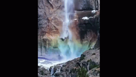 water fall, falls in the distance, rocks around