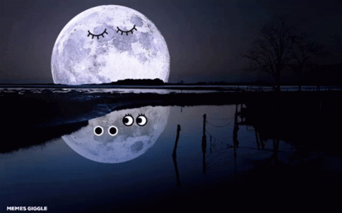 the full moon has been illuminated and has eyes drawn to look like eyes