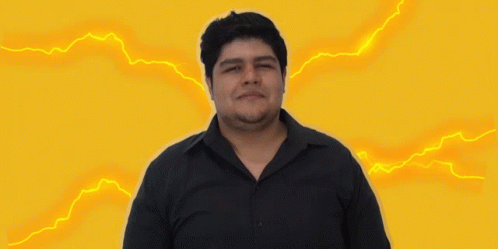 a man standing in front of a blue background with lightning