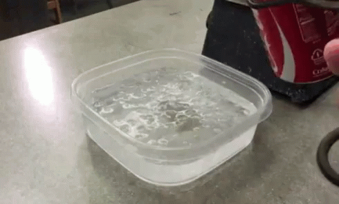 there is a plastic container with water on it