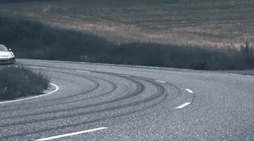 a car driving on a very curvy road