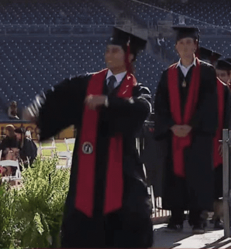 a group of graduates wearing graduation gowns are pographed