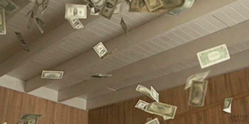 a room full of cash falling and falling from the ceiling