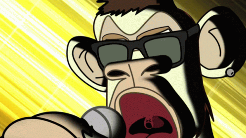 a man with a monkey face and sunglasses is holding soing