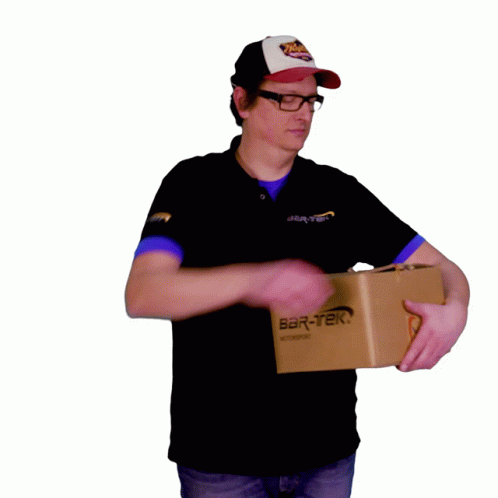 a person standing with a box in his hand