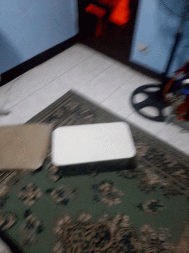 an image of a white box on a carpet