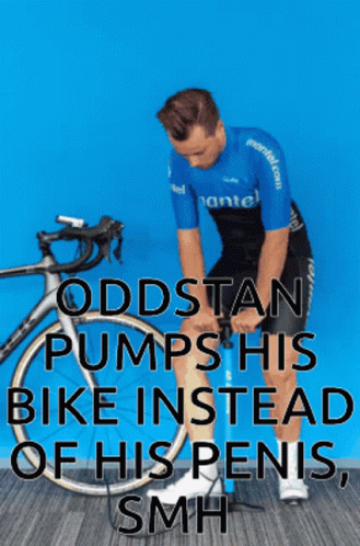 a man kneeling in front of a bicycle with a quote above him