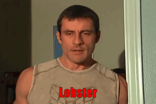 a man in his tank top with the word lobster in front of him